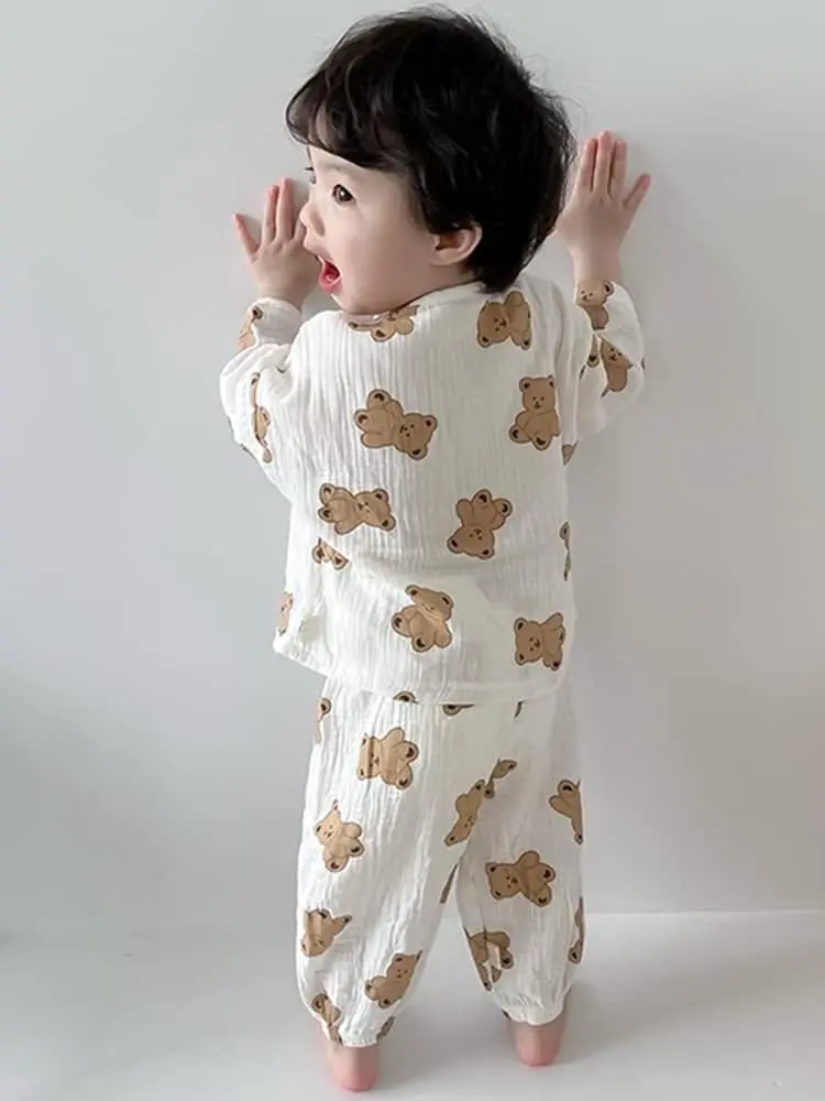 Young boy wearing a printed outfit